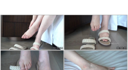 床边穿着编织拖鞋的玉足